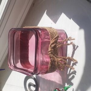 Burton and Burton 4 1/2" pink square vase with jute cord and bow.